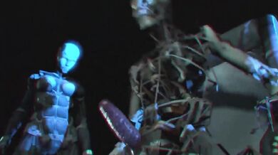 A group of robots, including the Yorha model 2B and her teammate Violet, gather for an erotic orgy in a futuristic world