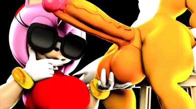 Amy Rose grabs Tails’ penis and rides him hard in the ocean while he tries to escape her clutches, but she won’t let go!