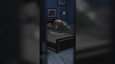 Busty MILF in tight jeans gets pounded by two massive cocks while tied up and blindfolded on the bed
