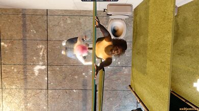 In the gutter, he finds solace from his misery as he indulges in public restroom sex