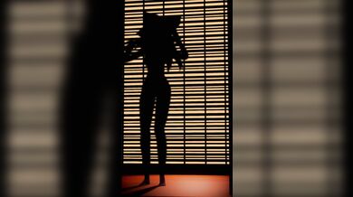 A sexy silhouette dance with Krag, the mysterious dancer! Watch as his muscular body moves to the beat in this erotic performance!