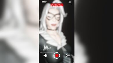 Watch as sexy black cat takes a selfie while seducing her white furry friend!