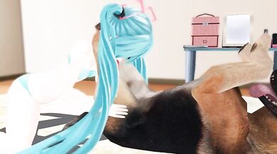 Miku enjoys some doggy playtime with her furry friend!