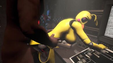 A young girl in a school uniform claps her hands to the beat of the music as she dances seductively, shaking her booty and thrusting her hips