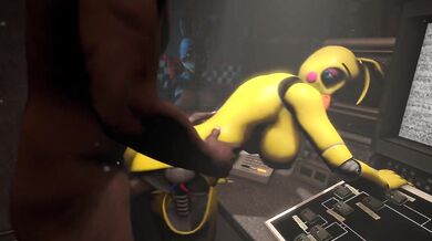 A young girl in a school uniform claps her hands to the beat of the music as she dances seductively, shaking her booty and thrusting her hips