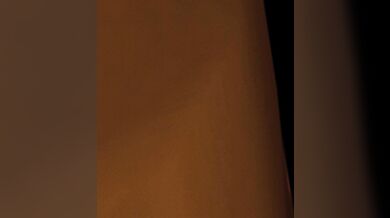 "Unbridled Desire: Nika Sharkeh's Passionate Kiss"