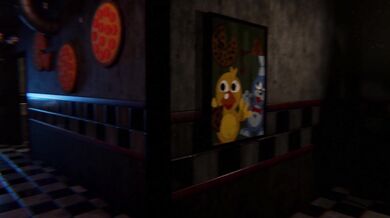 Two puppets having sex on a stage.