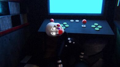 Two puppets having sex on a stage.