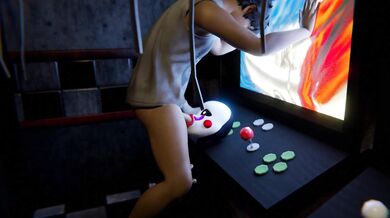 Two puppets having sex on a stage.