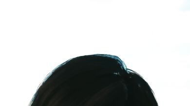 Young woman Yuffie is seen partially clothed in a modest outfit as she approaches the camera seductively.
