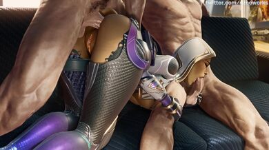 'Busty Vixen Strips Naked, Rubs Her Juicy Lips on Two Hard Cocks While Laying Down on a Luxurious Bed'