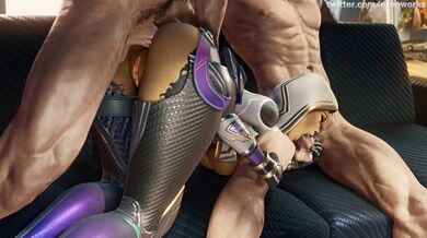 'Busty Vixen Strips Naked, Rubs Her Juicy Lips on Two Hard Cocks While Laying Down on a Luxurious Bed'