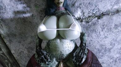 "Ebony Embraces Dwarven Machinery"