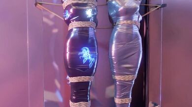 Two girls in sexy lingerie get tied up and mummified with electrical tape and duct tape for your pleasure