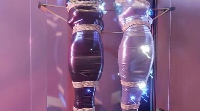 Two girls in sexy lingerie get tied up and mummified with electrical tape and duct tape for your pleasure