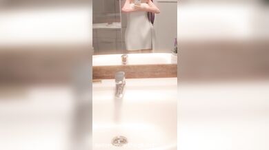 Mona, accidentally dropped her vibrator while getting dressed