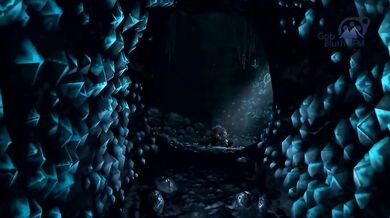 Lara Croft takes on a cave monster in the tombs of Egypt, while GOB Bluth, from the hit TV show Arrested Development, watches eagerly from afar