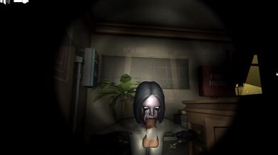 A young woman is seen sucking on a large dildo shaped like an X-Ray machine, while staring at the camera with lust in her eyes